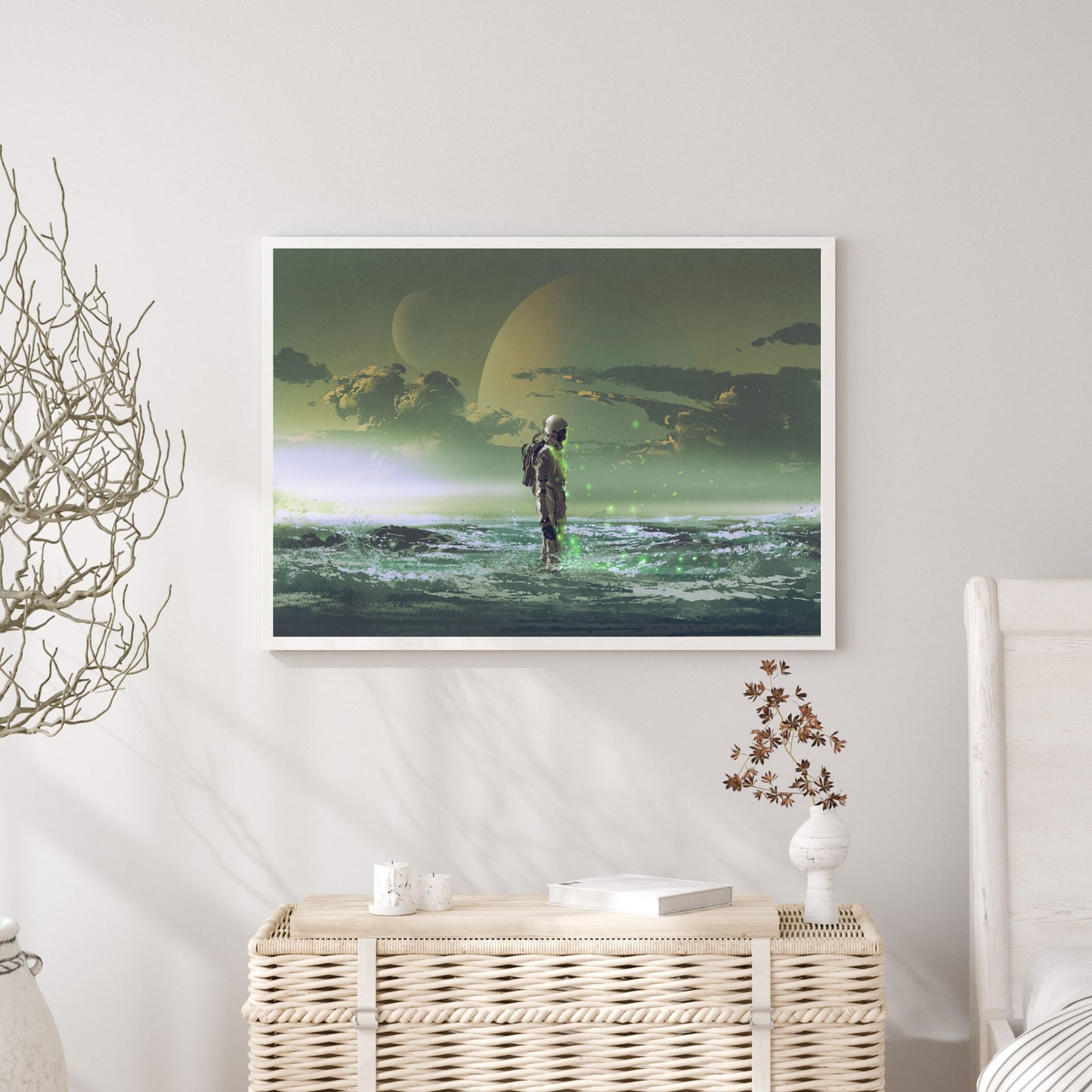 Astronaut standing by the sea against background of the planet