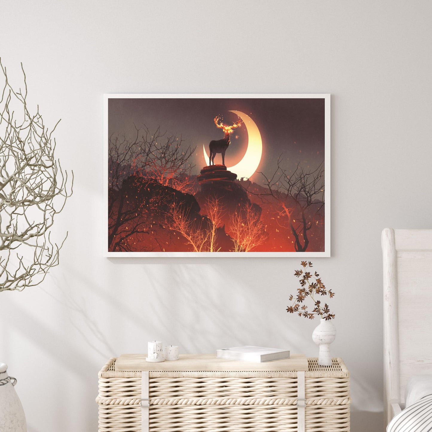 The deer with its fire horns standing on rocks in forest fire