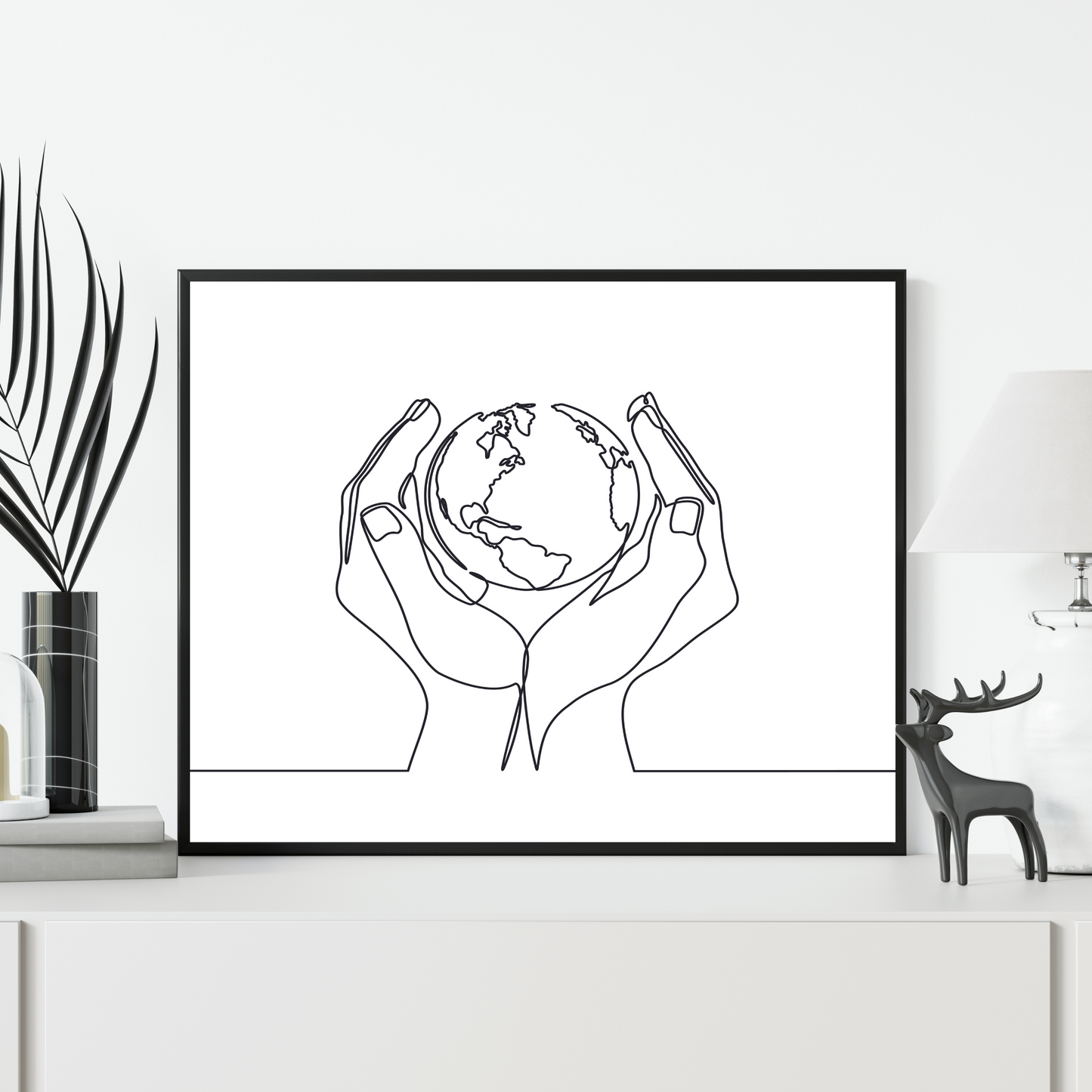 Line drawing of hands holding Earth globe