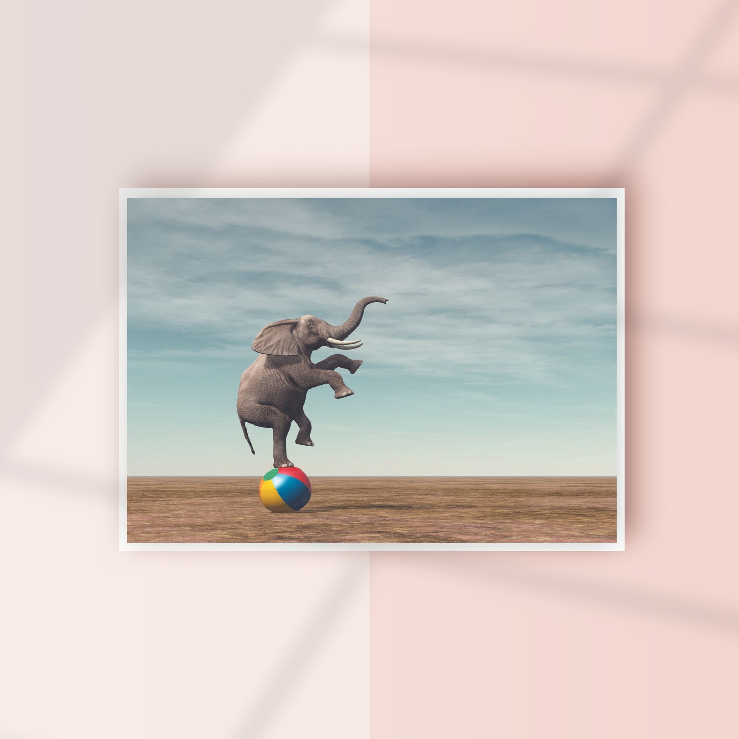 An elephant balancing on a beach ball