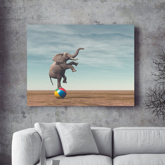An elephant balancing on a beach ball