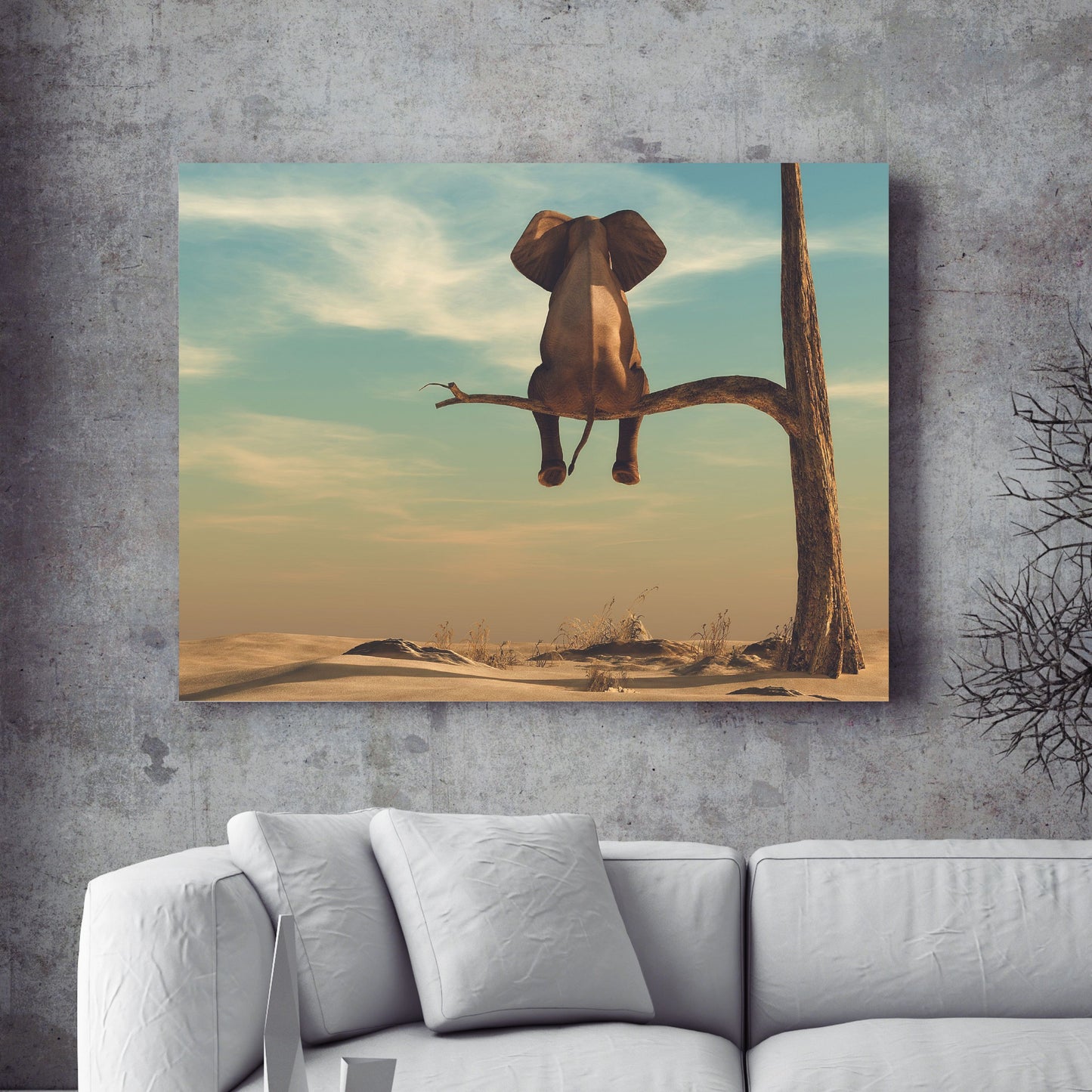 Elephant stands on thin branch of withered tree in surreal landscape