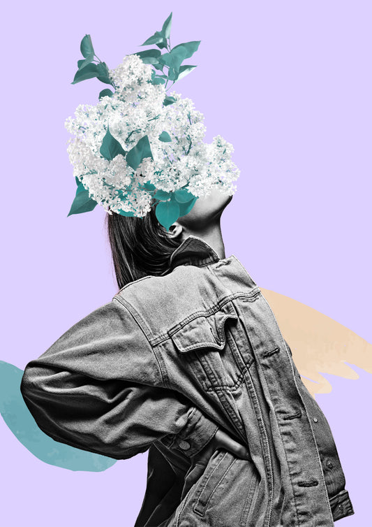 Woman in denim clothes with white flowers on her face